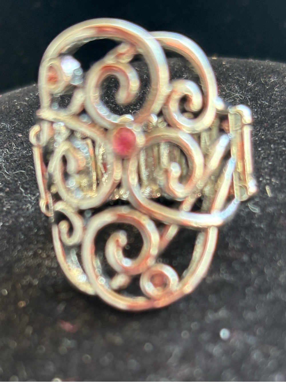 Intricate Silver Filigree Ring with Pink Accent Stone